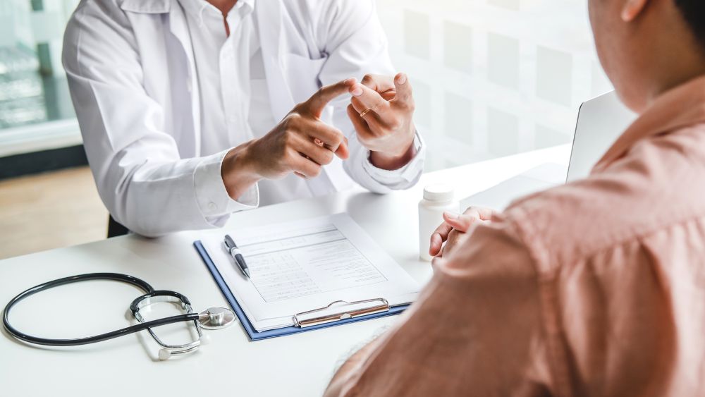 woman talking to fertility doctor